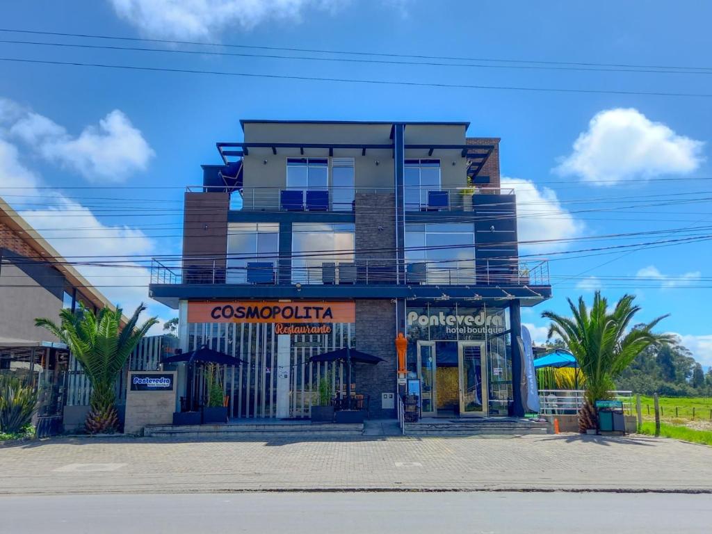 a building on the side of a street at Pontevedra Hotel Boutique in Paipa