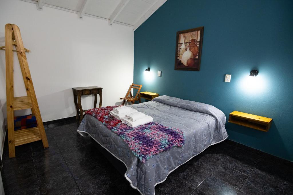 Postel nebo postele na pokoji v ubytování Hosteria Patagonia