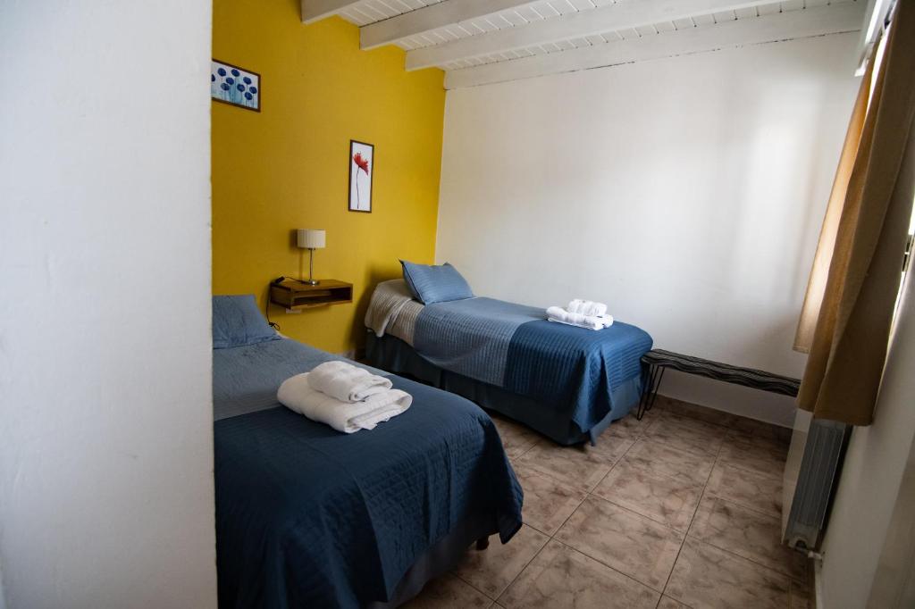 Postel nebo postele na pokoji v ubytování Hosteria Patagonia