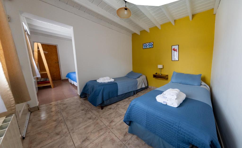 Postel nebo postele na pokoji v ubytování Hosteria Patagonia