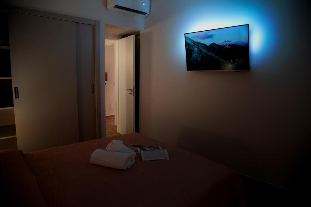 Postel nebo postele na pokoji v ubytování Fiore dei Templi - luxury suite experience