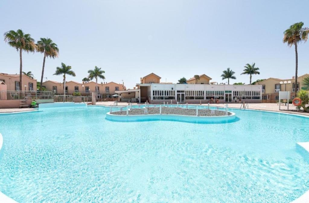 Bazén v ubytování MASPALOMAS GREEN OASIS CLUB playa nebo v jeho okolí
