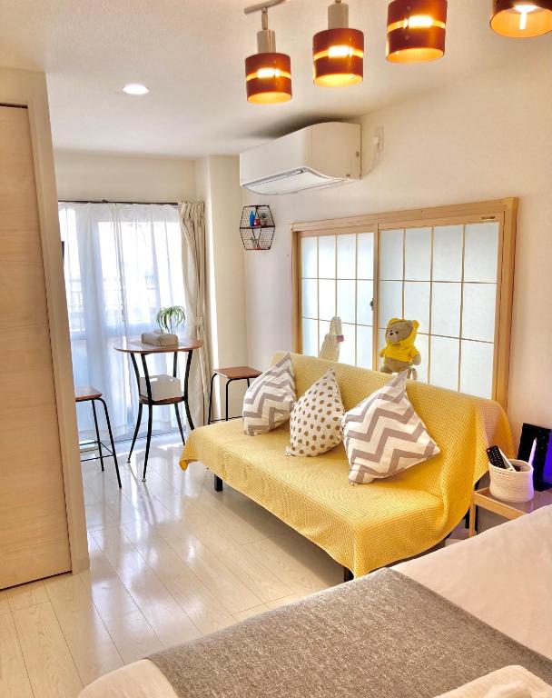 Posezení v ubytování KOSUMOSU Ikebukuro Shinjuku Private House