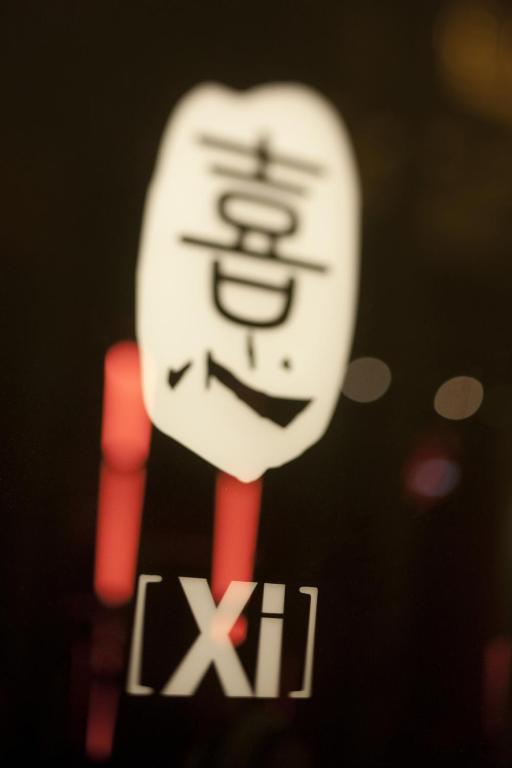 Certificato, attestato, insegna o altro documento esposto da Xi Hotel