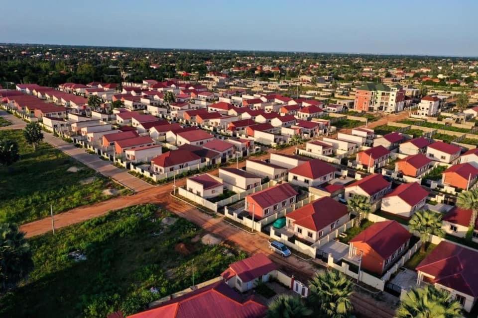 an overhead view of a suburb with red roofs at Rahims 3 Bed Bungalow - Dalaba in Jarbang