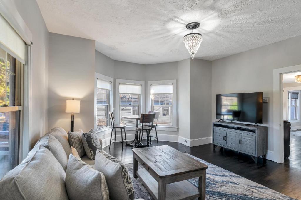 a living room with a couch and a table at 237 East Chestnut St in Asheville