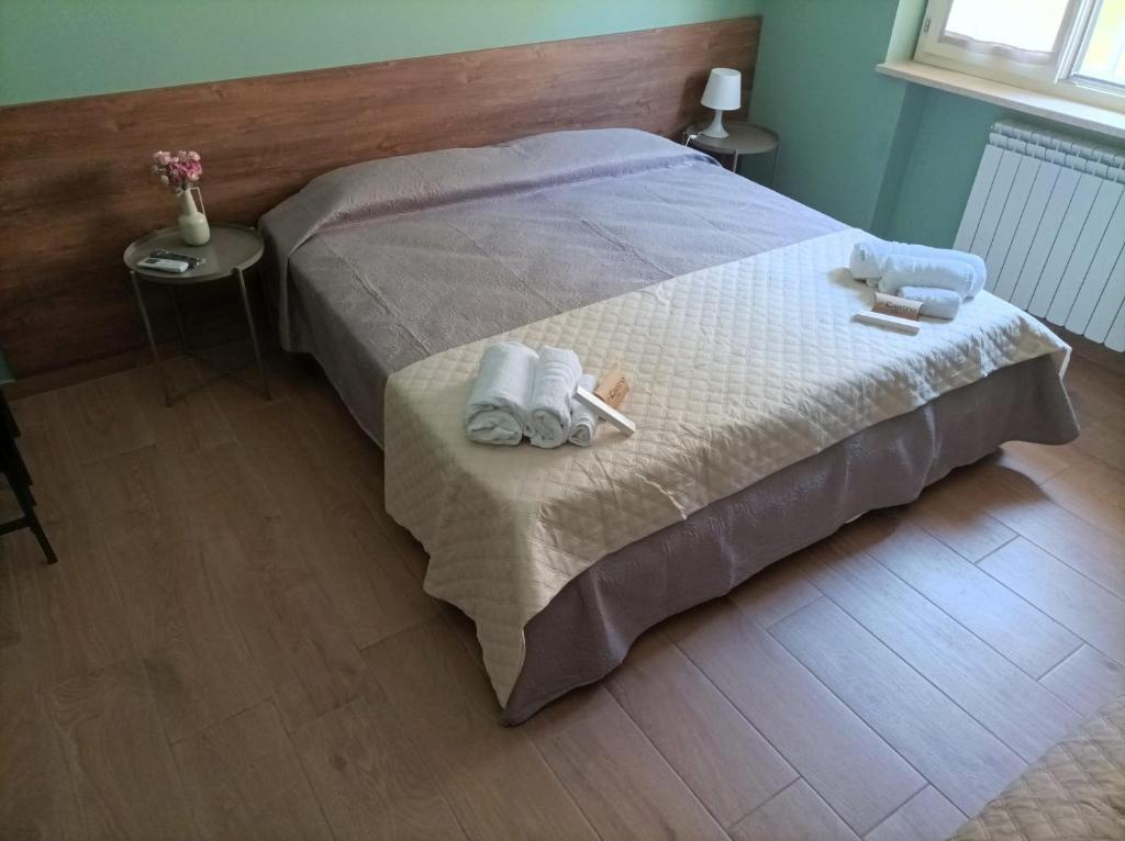 Postel nebo postele na pokoji v ubytování INCASTRO B&B IN CROTONE