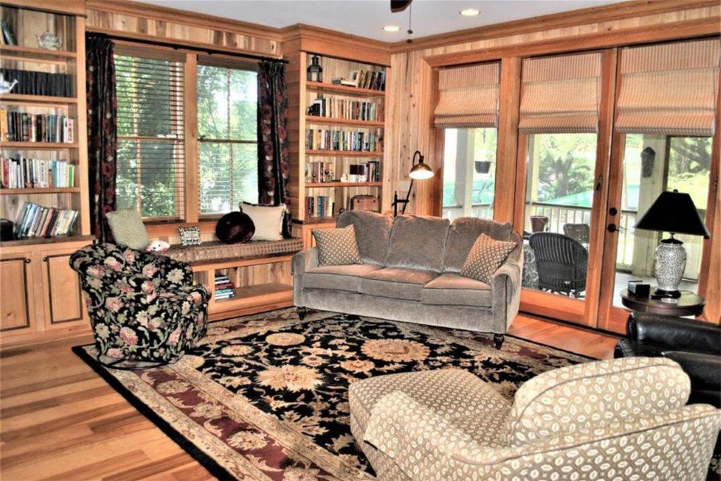 a living room with a couch and two chairs at Good Wood 3BR Walking distance to restaurants and shops along the waterfront of Winyah Bay in Georgetown