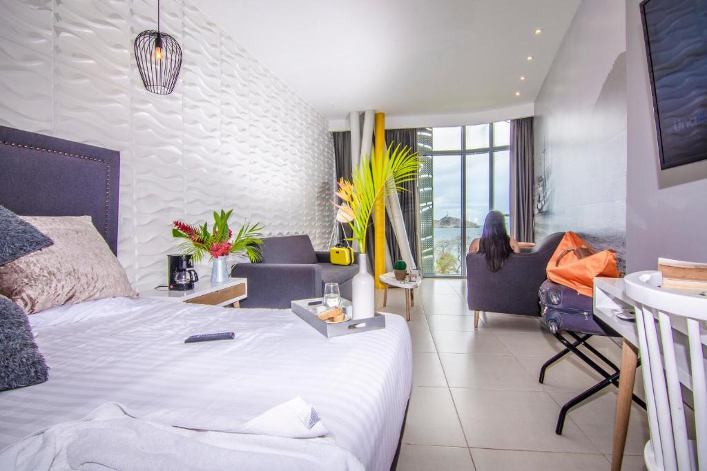 Postel nebo postele na pokoji v ubytování Bonita Bay Concept Hotel by Xarm Hotels