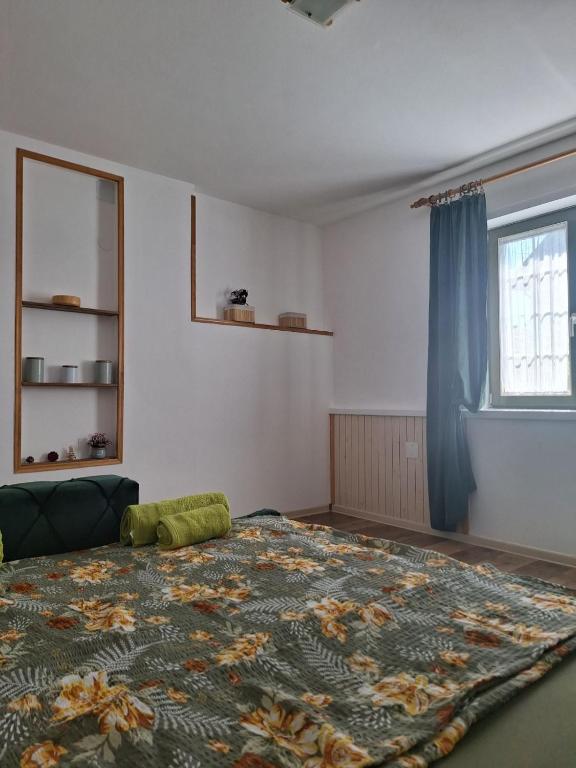 Postel nebo postele na pokoji v ubytování Bajka