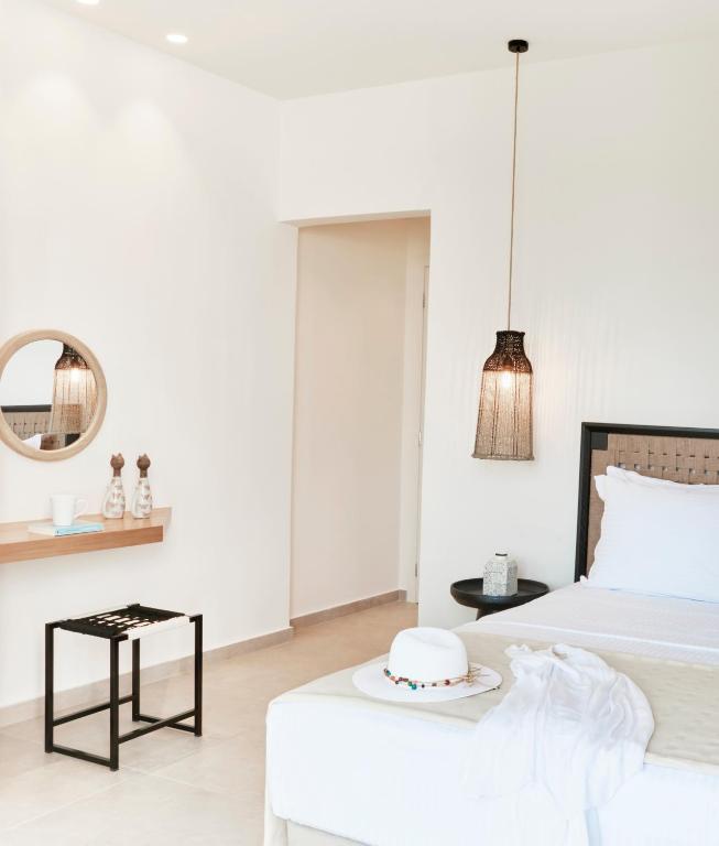 Postel nebo postele na pokoji v ubytování Skiathos Ammos Luxury Apartments