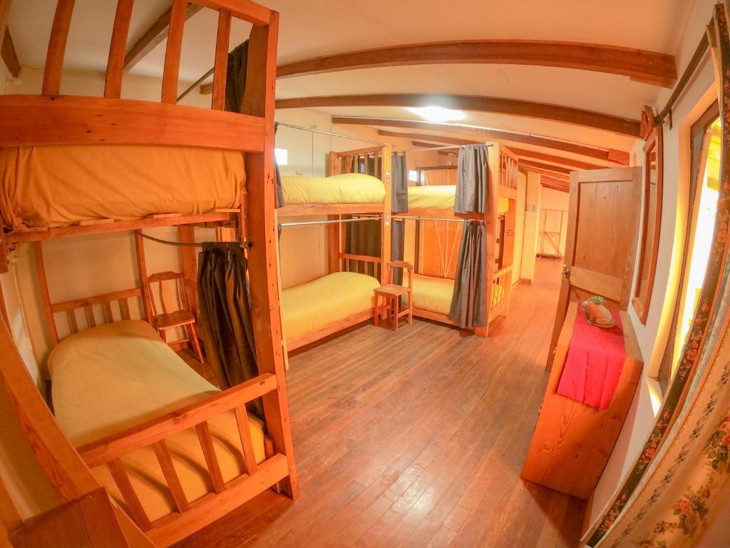 Postel nebo postele na pokoji v ubytování Anata Hostal