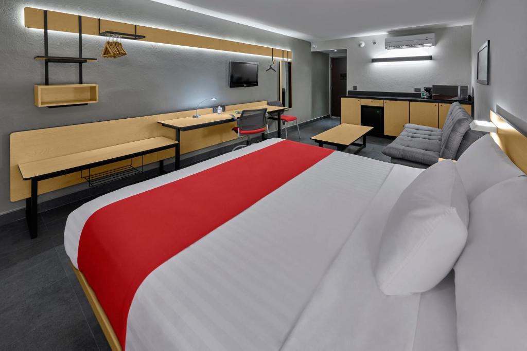 Postel nebo postele na pokoji v ubytování City Express by Marriott Veracruz