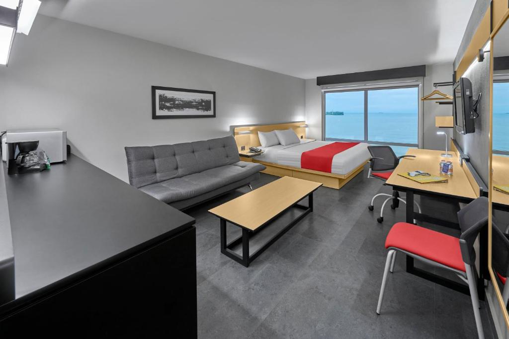Postel nebo postele na pokoji v ubytování City Express by Marriott Veracruz