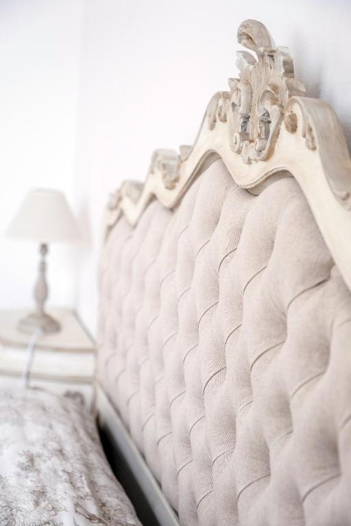 a close up of a bed in a bedroom at Althea in Viareggio