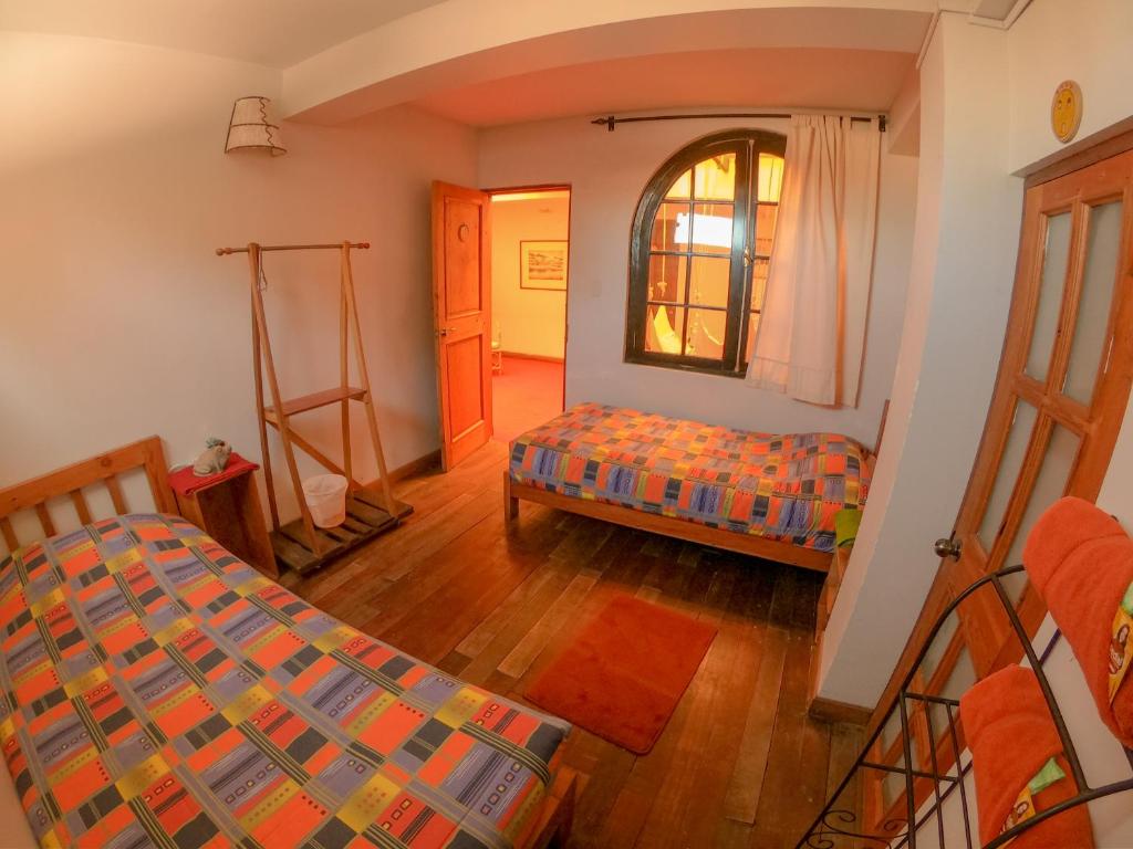 Postel nebo postele na pokoji v ubytování Anata Hostal