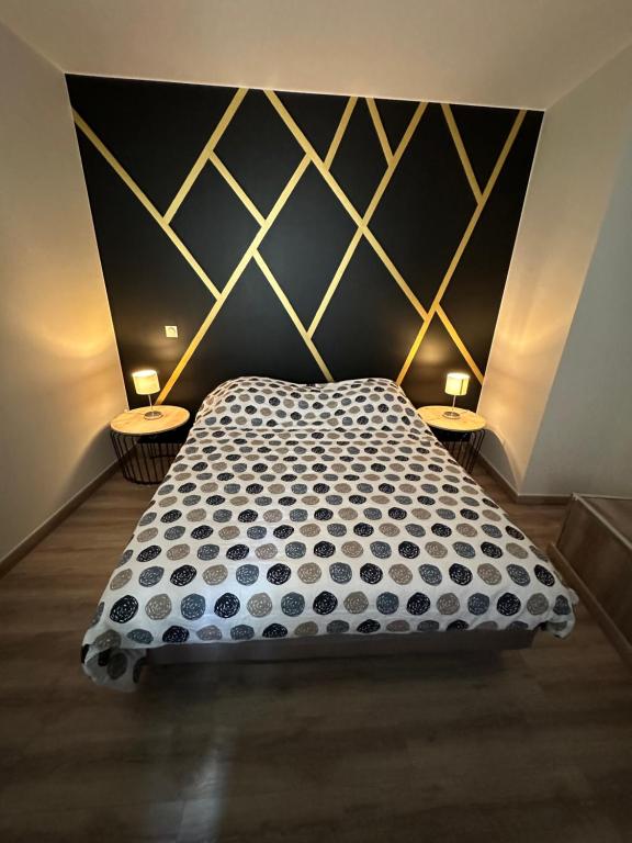Ένα ή περισσότερα κρεβάτια σε δωμάτιο στο Résidence le Marcadieu