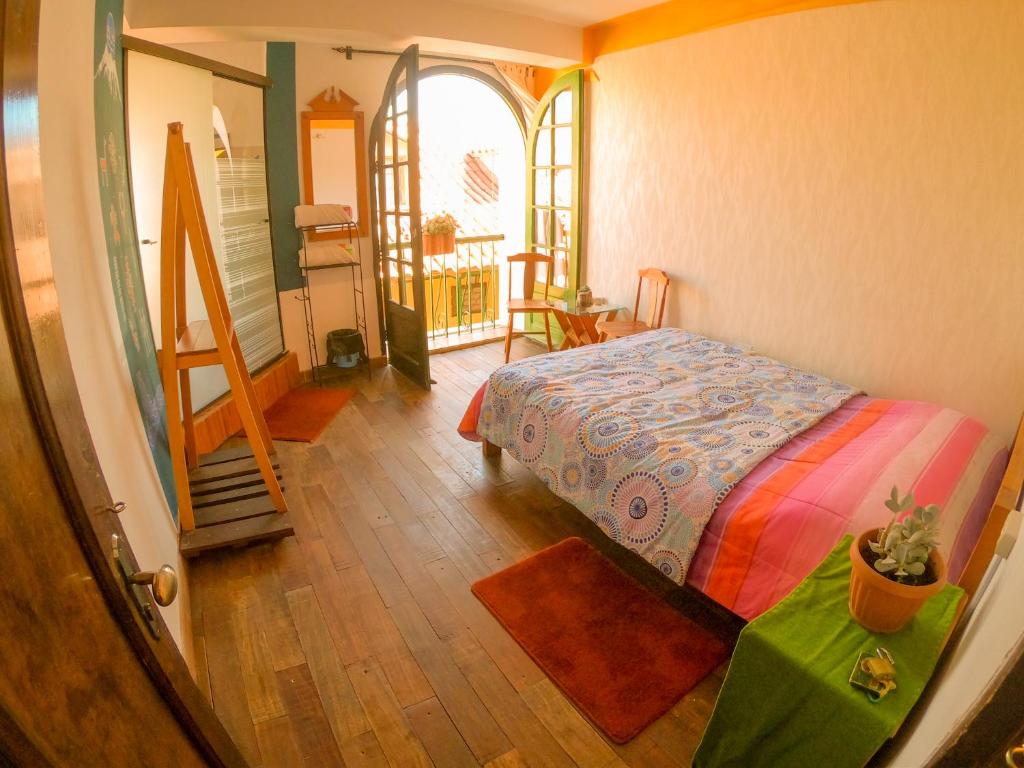 Postel nebo postele na pokoji v ubytování Anata Hostal