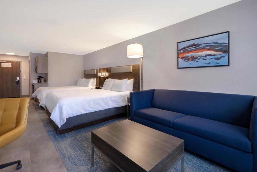 Postel nebo postele na pokoji v ubytování Holiday Inn Express Hotel & Suites Moab by IHG