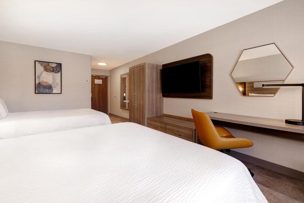 Postel nebo postele na pokoji v ubytování Holiday Inn Express Hotel & Suites Moab by IHG