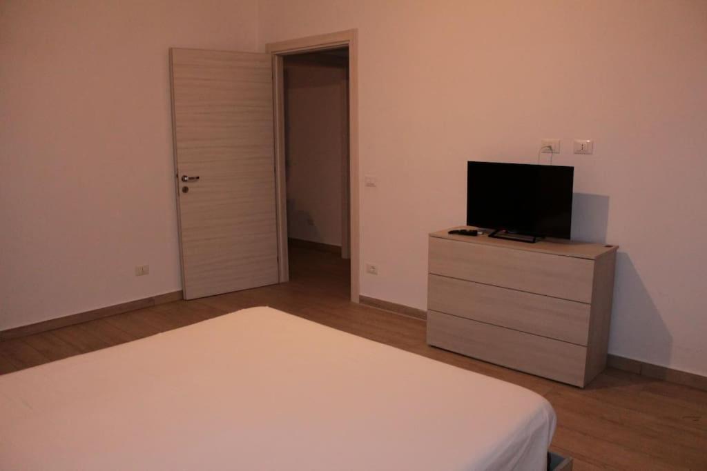 Posteľ alebo postele v izbe v ubytovaní Alloggio turistico a casa di Paoletto