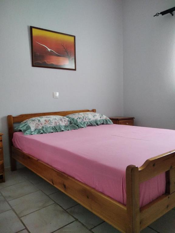 Postel nebo postele na pokoji v ubytování Labyrinthos Apartments