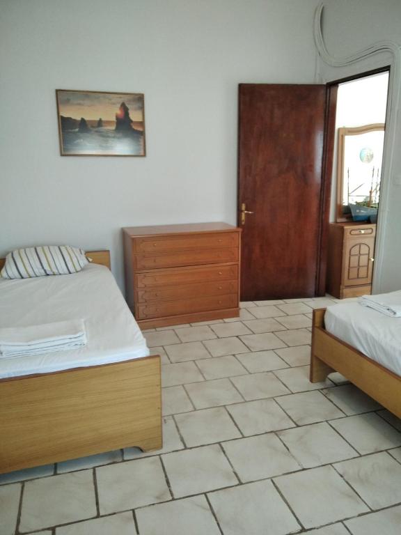 Postel nebo postele na pokoji v ubytování Labyrinthos Apartments