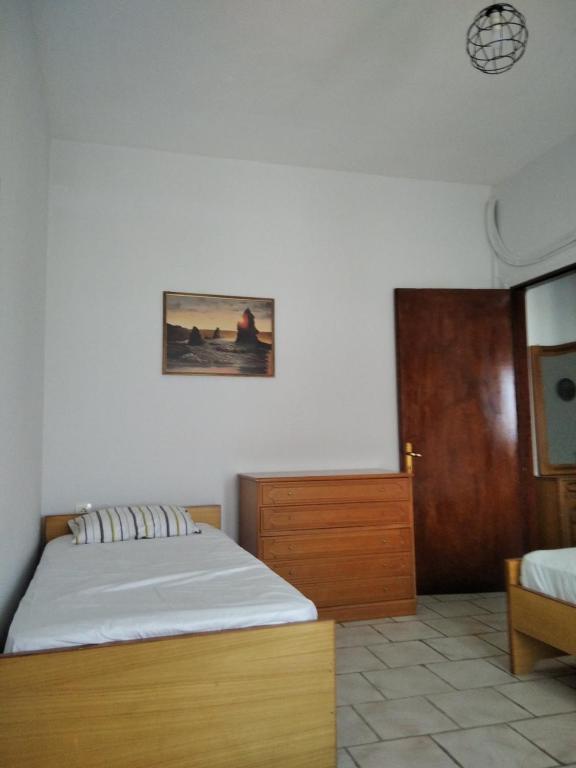 Postel nebo postele na pokoji v ubytování Labyrinthos Apartments