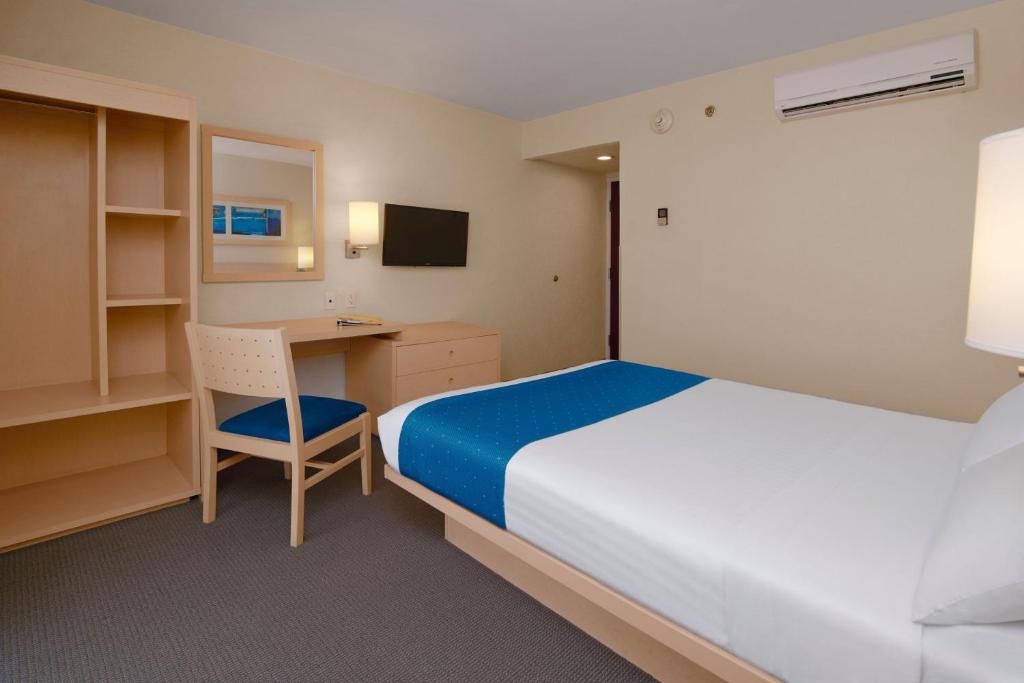 Cama o camas de una habitación en City Express by Marriott Puebla FINSA