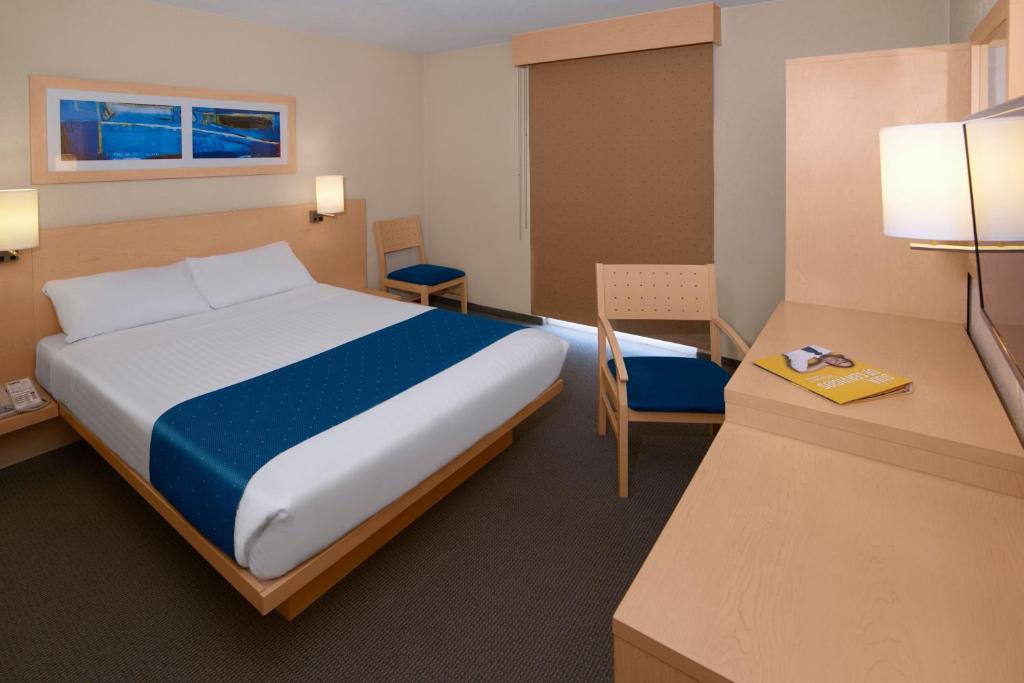 Cama o camas de una habitación en City Express by Marriott Puebla FINSA
