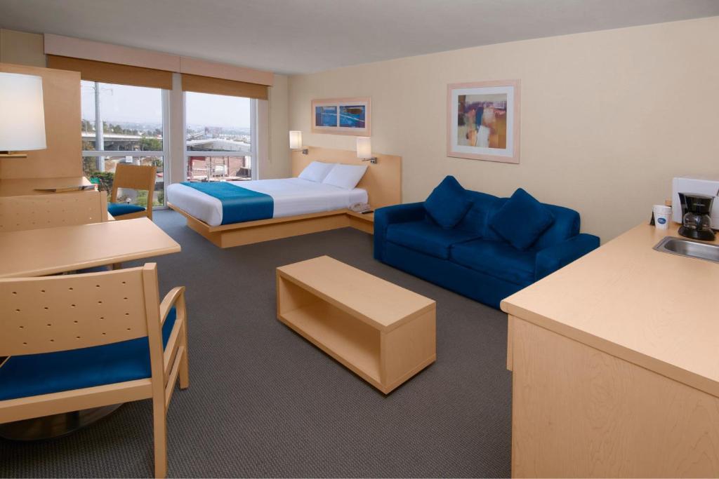 Cama o camas de una habitación en City Express by Marriott Puebla FINSA