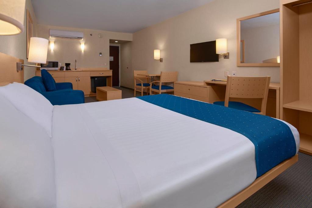 Cama o camas de una habitación en City Express by Marriott Puebla FINSA
