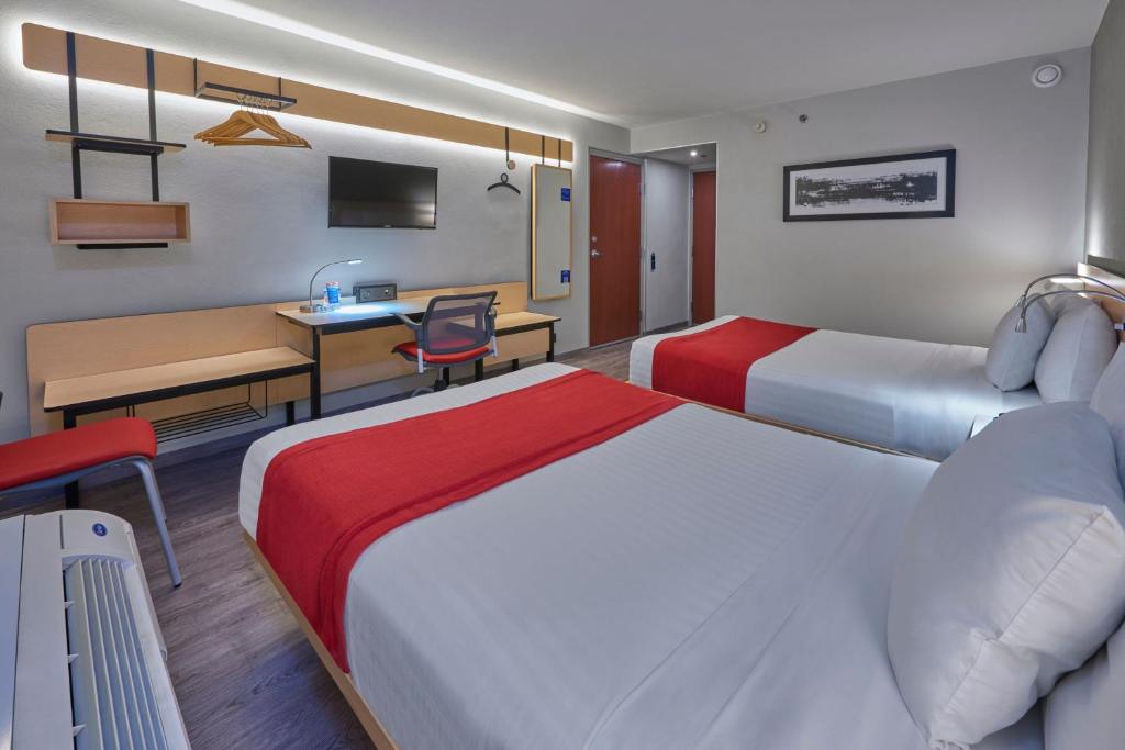 TV a/nebo společenská místnost v ubytování City Express by Marriott Irapuato