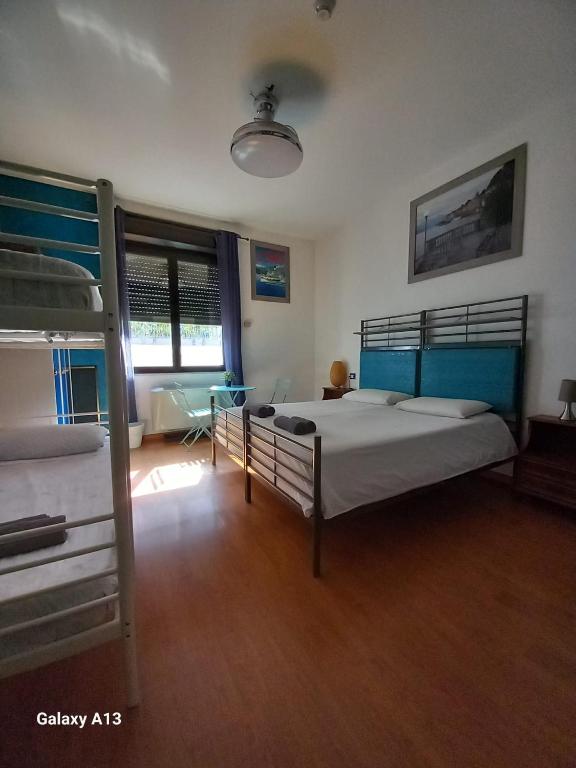 Posteľ alebo postele v izbe v ubytovaní Atmos Luxe Navigli