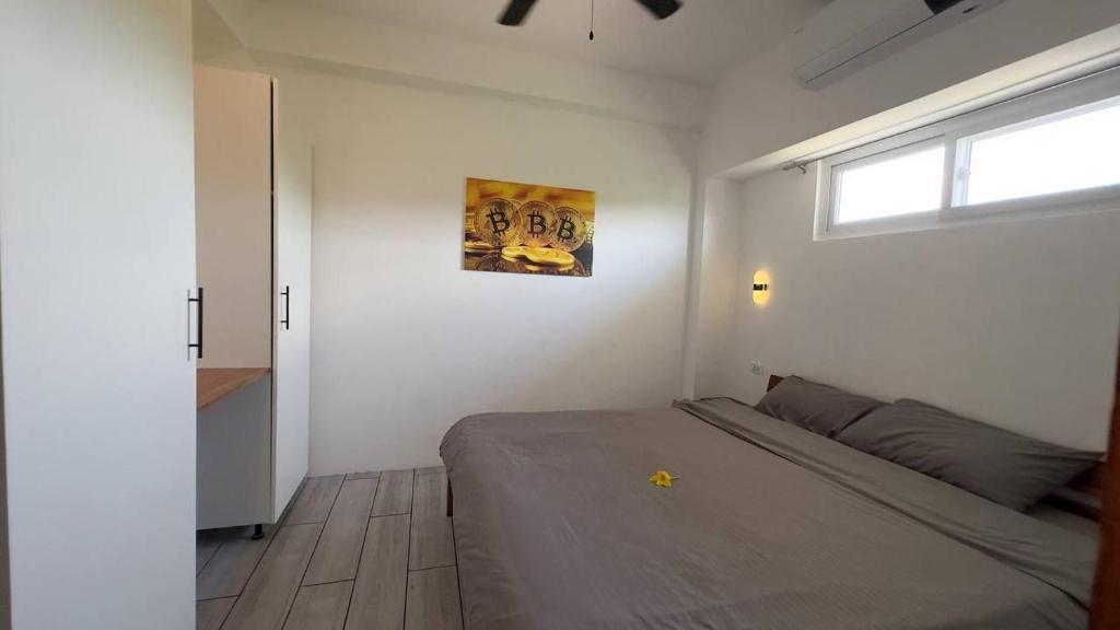 Postel nebo postele na pokoji v ubytování Tablas Seaview Homestay