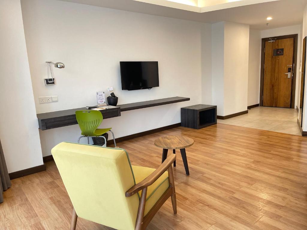 TV a/nebo společenská místnost v ubytování Win Hotel