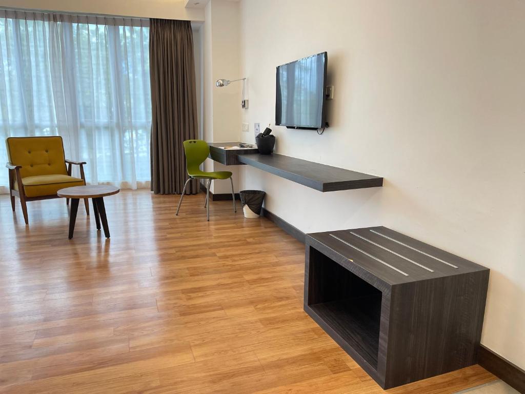 TV a/nebo společenská místnost v ubytování Win Hotel