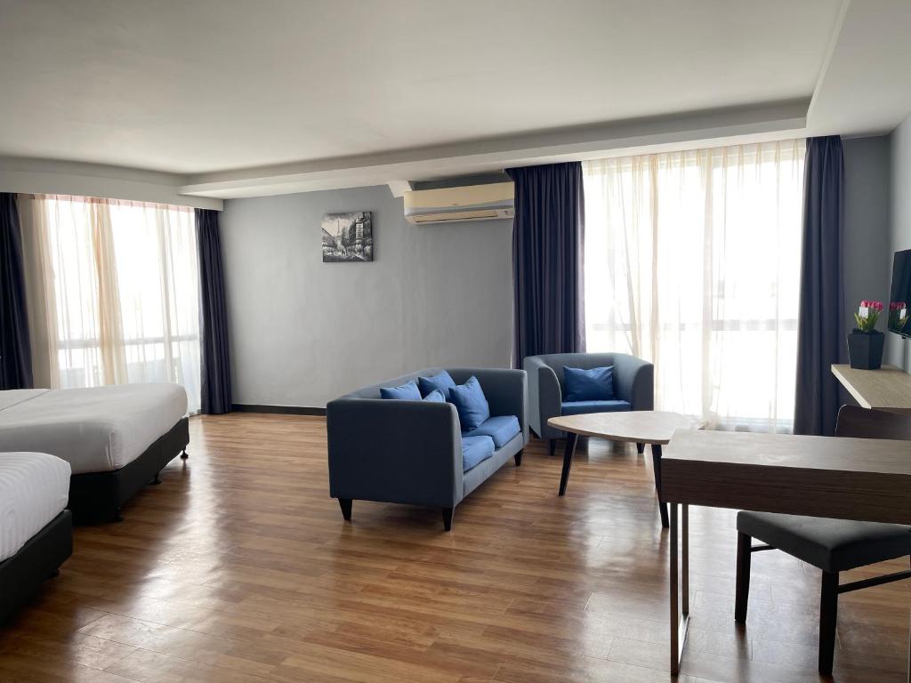Postel nebo postele na pokoji v ubytování Win Hotel