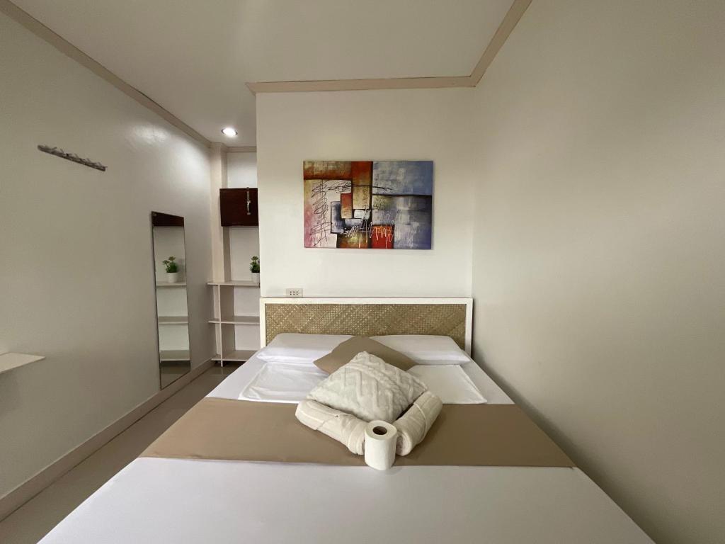 Postel nebo postele na pokoji v ubytování LISA'S GUESTHOUSE