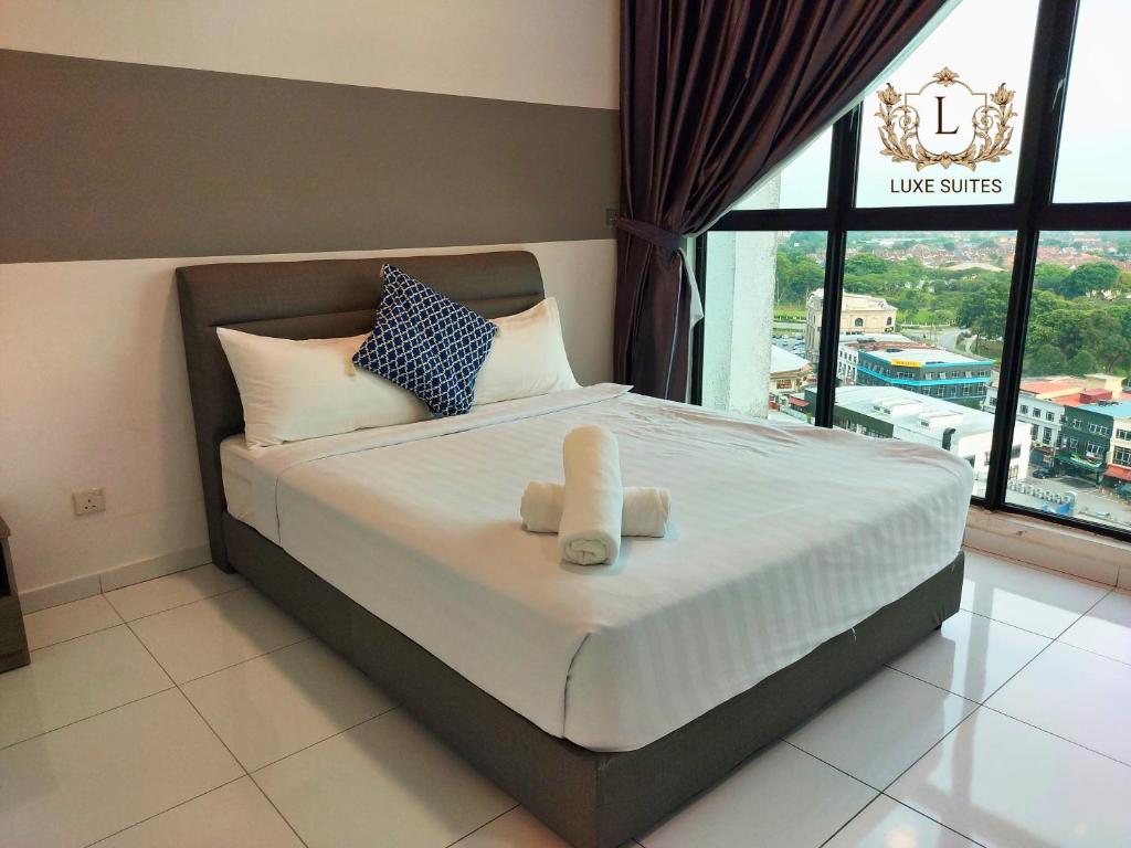 Postel nebo postele na pokoji v ubytování Luxe Suites at Skyloft