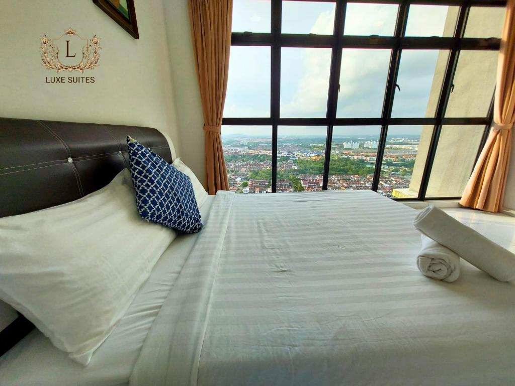 Postel nebo postele na pokoji v ubytování Luxe Suites at Skyloft