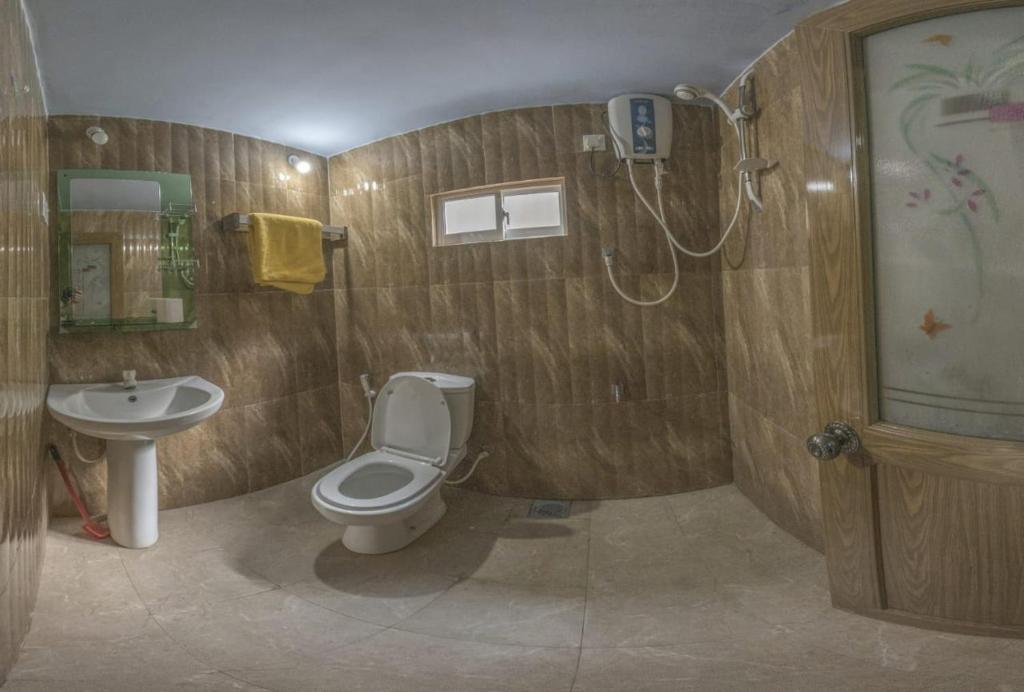 Koupelna v ubytování Apple Sara Home Stay