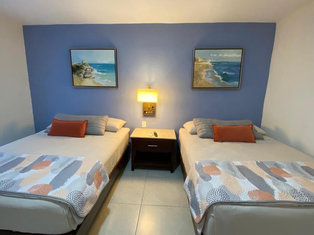 Ένα ή περισσότερα κρεβάτια σε δωμάτιο στο Estudio con Patio