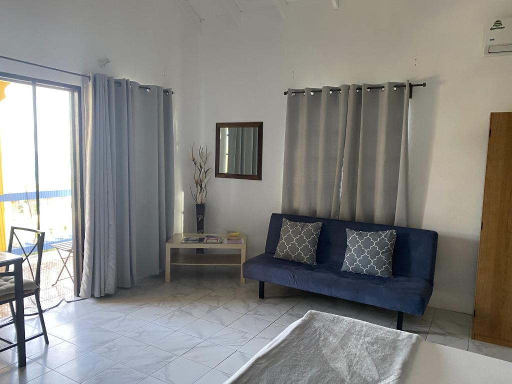 Posezení v ubytování Bay View Studio Apartment 3C - Canouan Island
