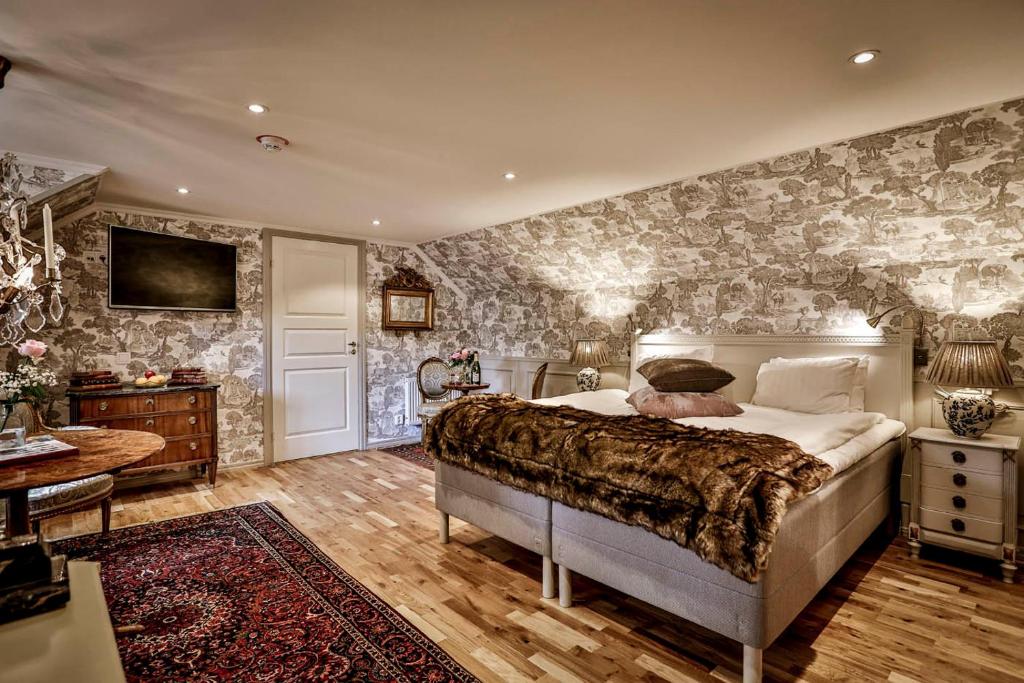 TV a/nebo společenská místnost v ubytování Vadstena Klosterhotell Konferens & Spa