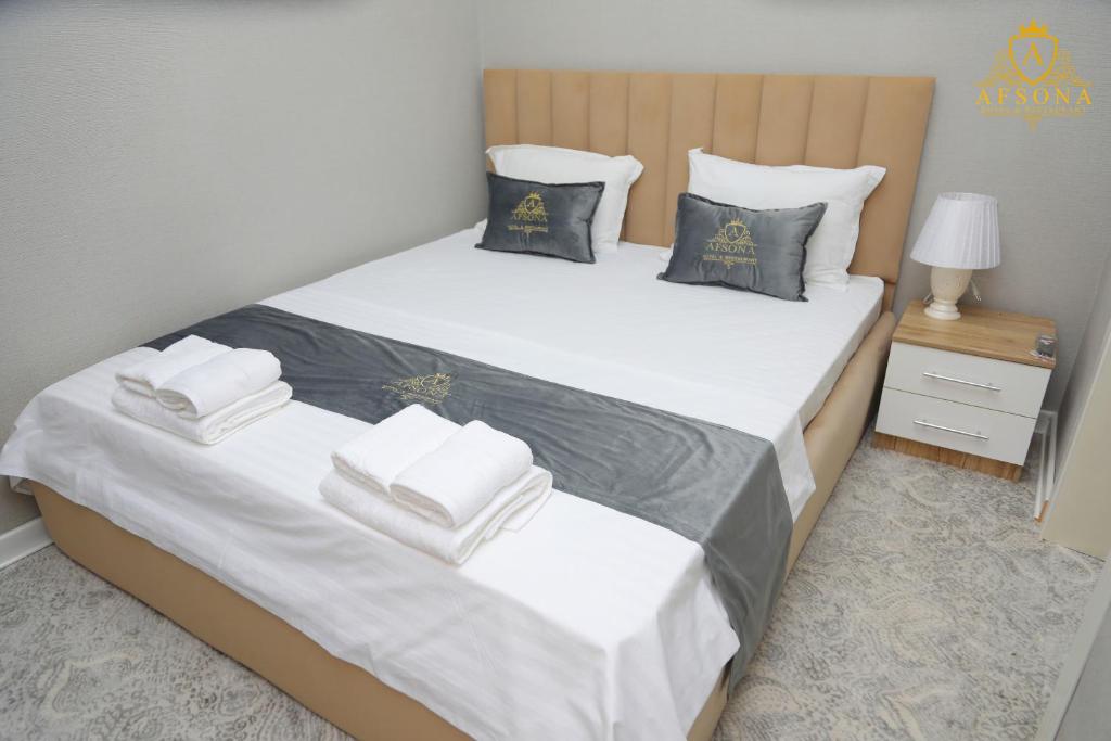 Cama o camas de una habitación en Afsona Hotel