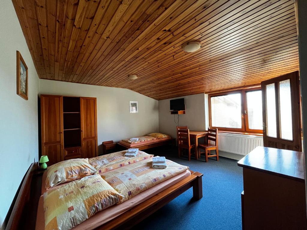 Postel nebo postele na pokoji v ubytování Penzión Mizuna
