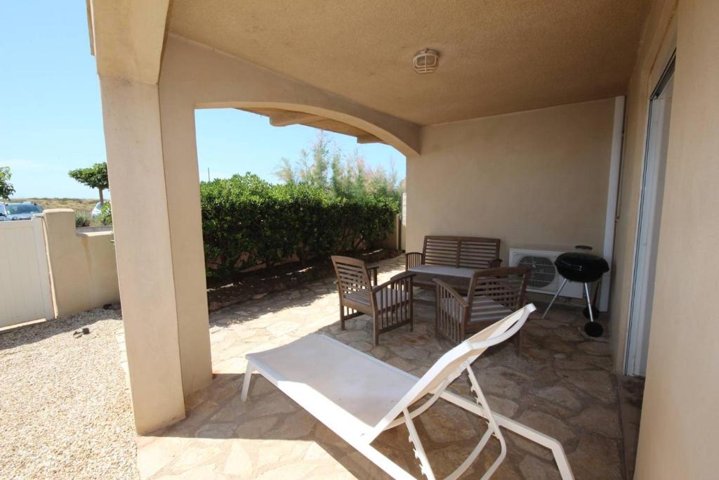 FACE à la Mer, Superbe appartement climatisé au RDC d'une maison, classé 4 étoiles, 5 couchages -WIFI-PORTIRAGNES PLAGE LXBFM32 - Twee Slaapkamers Appartement