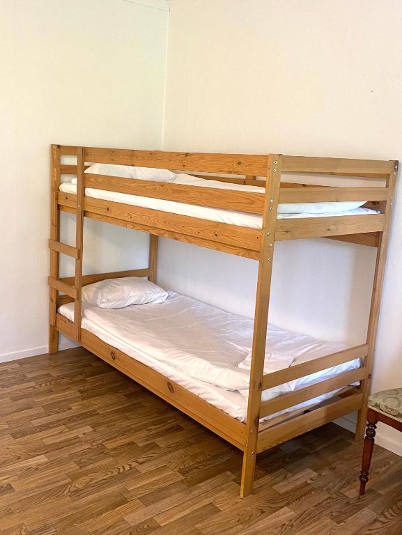 Postel nebo postele na pokoji v ubytování Gullringens Värdshus & hotell