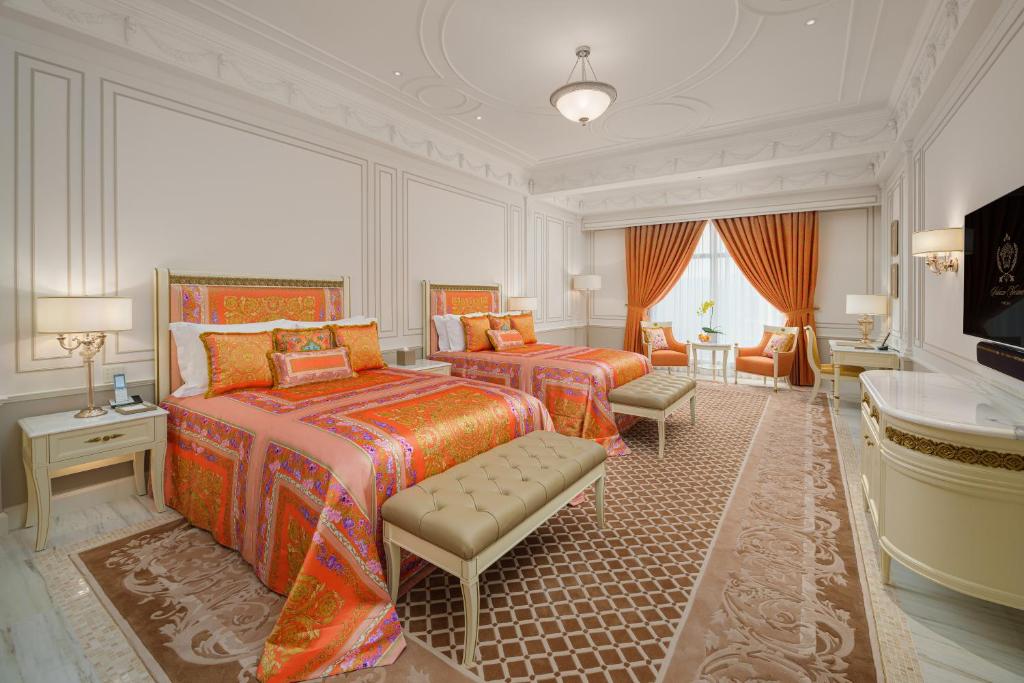 Postel nebo postele na pokoji v ubytování Palazzo Versace Macau